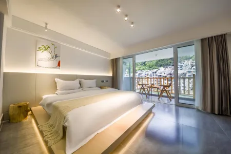 Zhenyuan Yanliangqi Homestay Отели рядом с достопримечательностью «New Bridge»