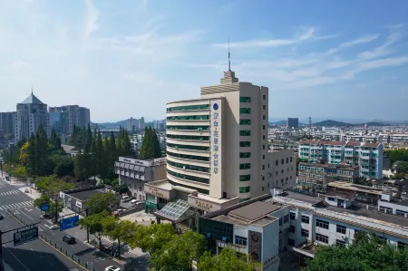 Zijin HuaJiYaShe Hotel (Changxing Dongyufang Jiuhuicheng) Отели рядом со станцией Changxing Railway Station