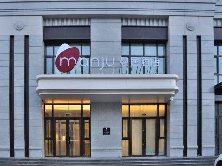 Manju Hotel (Changchun Yuanda Shopping Center) Отели рядом с достопримечательностью «Changchun Workers Gymnasium»