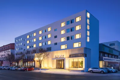 Yuerong Hotel (Liaoyang Liaohua Tesco) Hotel dekat Pengjia Residence