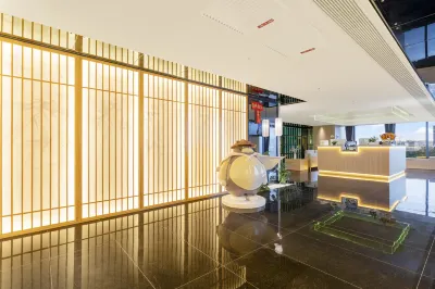 Dragon Cat Spirit Hotel (Baili Plaza New Dongmen Store, Yangjiang) 바이리광장 호텔