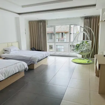 Lucky Homestay Отели рядом с достопримечательностью «Xianglu Mountain»