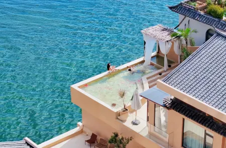 Shuanglang Jianglu Lunas Litus Hotel Отели рядом с достопримечательностью «Daoyibang Fishing Village»