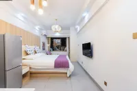 Jinghong Shanfeng Yuyi Homestay (Poshui Plaza) - chambre d’hôtes