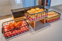 Vienna International Hotel (Huangchuan Xiyalibao) - breakfast