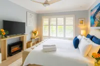Welcome to Your Peaceful 2BR Villa Retreat Hotels near Ancona Avenue Playground