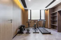 Yueqing Yueyouju Hotel (Jiali Square ) Отели в г. Юэцин