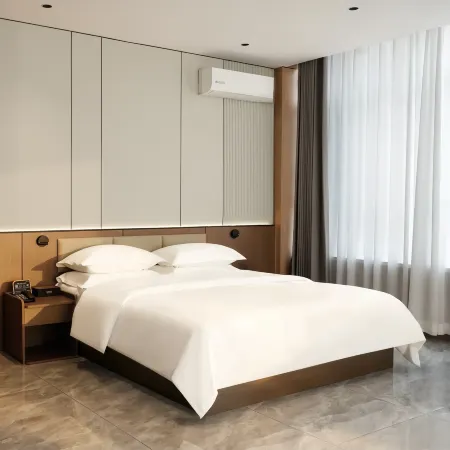 Daqing Youmi Hotel ( Bayi Agricultural University Moma Plaza)