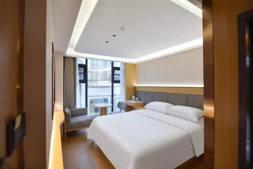 Pengke Hotel (Xingyi Jushan Square Mengle City Branch)