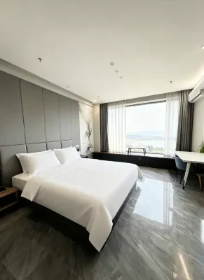Wanjia hotel apartment (Jiamusi Wanda Plaza store) Hotels in Jiao District