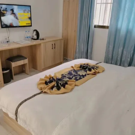 Shuangbai Damai Dikangjia Inn