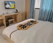 Shuangbai Damai Dikangjia Inn - พร้อมWifi
