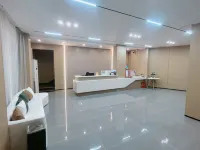 Four Seasons Smart Hotel (Zhoukou Passenger Transport Center Station)