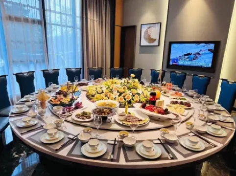 Lvbao Yinhe Hotel Отели в г. Мэнцзы