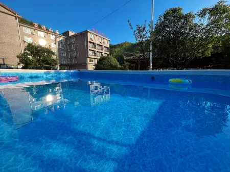 Daweishan Wanfu Mountain Villa Отели рядом с достопримечательностью «Daweishan National Forest Park»