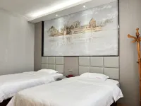 7 xing Ge Business Hotel