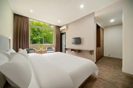 Rongxian Xinghe Hotel Отели рядом с достопримечательностью «Giant Buddha in Rong County»