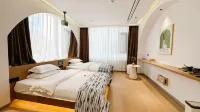 Jianchuan Hejia Homestay - พร้อมอาหารเช้า