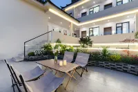 Rustlux仟那·雪山觀景花園庭院設計師美宿（古城大水車店） 鄰近麗江古城獅子山觀景台的酒店