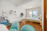 Rongcheng Rose Fragrant Sea Apartment - น้ำพุร้อน