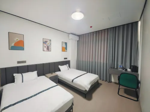 Youjian Homestay (Chengtou Town Yaqi Yuanhong Trade City)