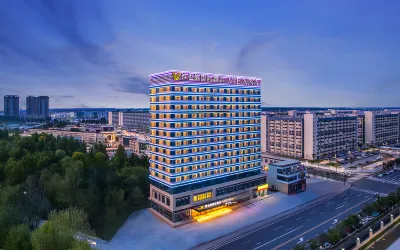 Vienna International Hotel (Zhengzhou Xinzheng Baihui New World BYD New Energy Industrial Park) Отели в г. Синьчжен