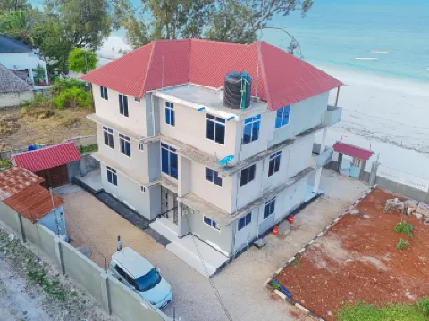 Uroa Beachfront 2BR • Balcony • Free Wi-Fi Hotels in 