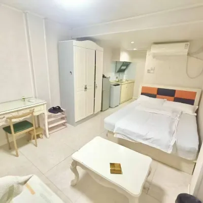 Aishang Apartment (Ningbo Railway Station West Gate Subway Station) Отели рядом с достопримечательностью «Комплекс «Башня барабана Нинбо»»