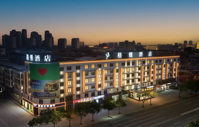 GreenTree Hospitality Group - (Gya)