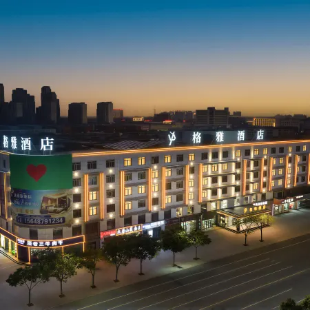 GreenTree Hospitality Group - (Gya)