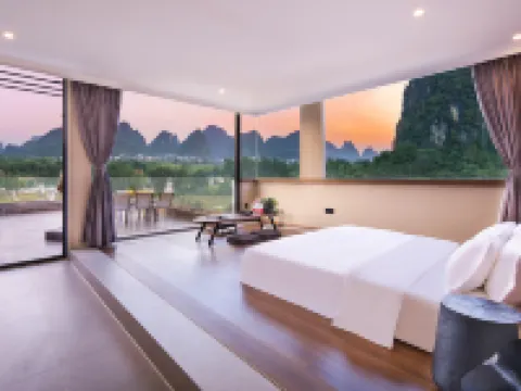 รีสอร์ทหยู่หยวน หยางซั่ว (แกลเลอรี่ซือหลี่ & แม่น้ำหยู่หลง) โรงแรมใกล้อูฐข้ามแม่น้ำ