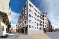 汕頭潮曼輕奢客房（潮南峽山美食街店） 福萬家購物廣場峽山店附近的飯店