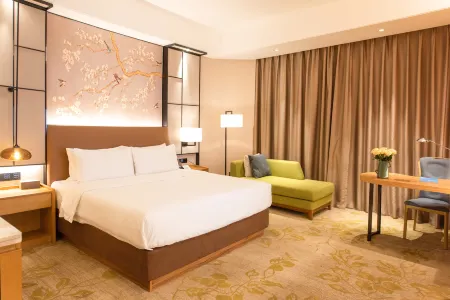 Rising Dragon International Hotel Отели рядом с достопримечательностью «Fuyuan Youye»