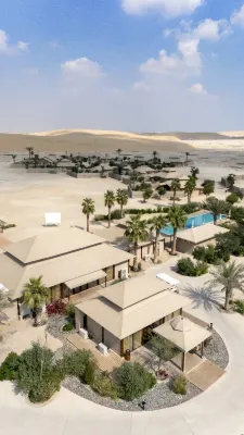 The Outpost Al Barari Camp Hotels near Mesaieed beach with sand dunes