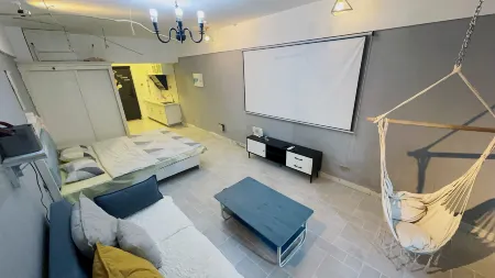 Baicheng Huiya Apartment Отели в г. Байчэн