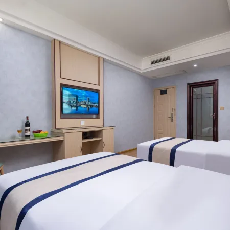Yueyang Xinjia Business Hotel (Bazimen Yueyang East Railway Station)