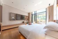 Huguan Xinghengyang Holiday Hotel - Balkoner