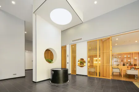 G Joyful Chujian Hotel (Mengzi Station) Отели рядом с достопримечательностью «Honghe College»