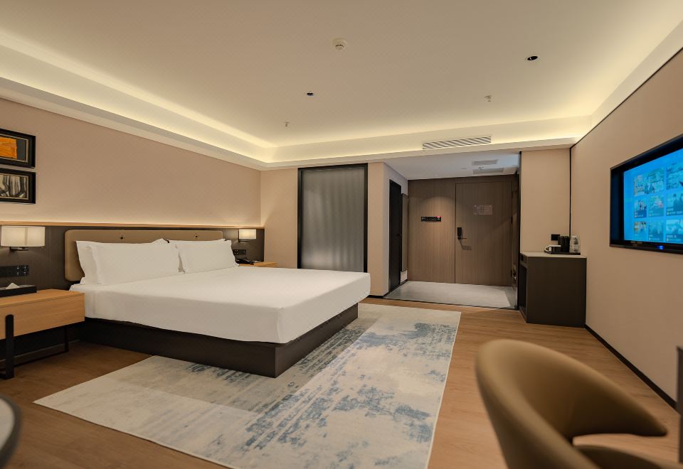 쑤이화 진후이 호텔의 깔끔한 객실 이미지