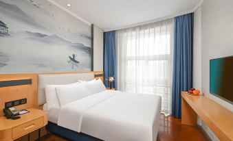 QingZhu Four Seasons Chain Hotel (Nanjing Lukou Airport Branch)