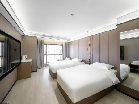 Chifeng Gunei Hotel (Wanda Plaza) Отели рядом с достопримечательностью «Inner Mongolia Vocational and Technical College of Traffic»