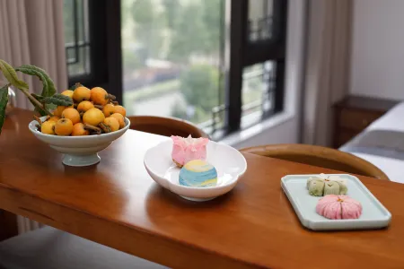 Suzhou Nuanzu Boutique Minsu Отели рядом с достопримечательностью «Ботанический сад Цзяньнан»