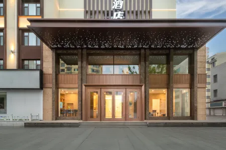 Magnotel Hotel (Jiamusi City Huochezhan Xinmate)