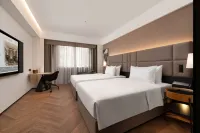 Manon Hotel Yining Border Economic Cooperation Zone Отели в г. Иньинг