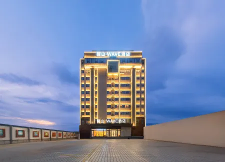 Xingshan WAVE Hotel (Jingjiang People's Park) Отели рядом с достопримечательностью «Huaide College of Changzhou University (Jingjiang Campus)»