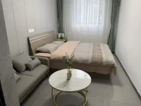 Junshangyuan White-collar Apartment (Sheshan Forest Park Branch) 쉬산/서산-쑹장/송강 대학타운 호텔