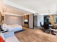 Jinyi International Hotel (Baolong Plaza) - balcone
