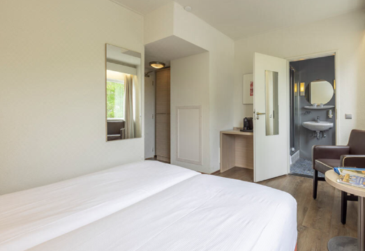 플레처 호텔 레스토랑 데 위트 라프 테라스와 정원