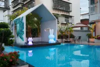 Mujiangnan Hotel (Xishuangbanna Jinghong Water Splashing Square Branch) - Kolam Renang