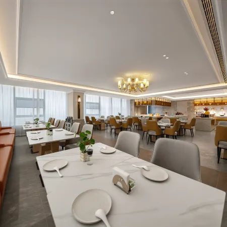 Vienna International Hotel (Heze Shan Development Zone Shunshi Building)